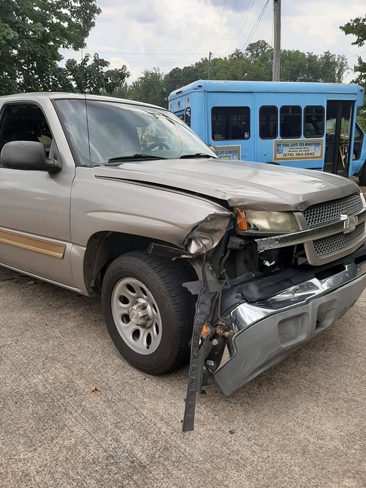 A Gray Chevrolet Silverado got an accident and got a dent!! - By SuperDriveUSA